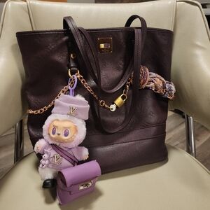 purple etro scarf and labubu